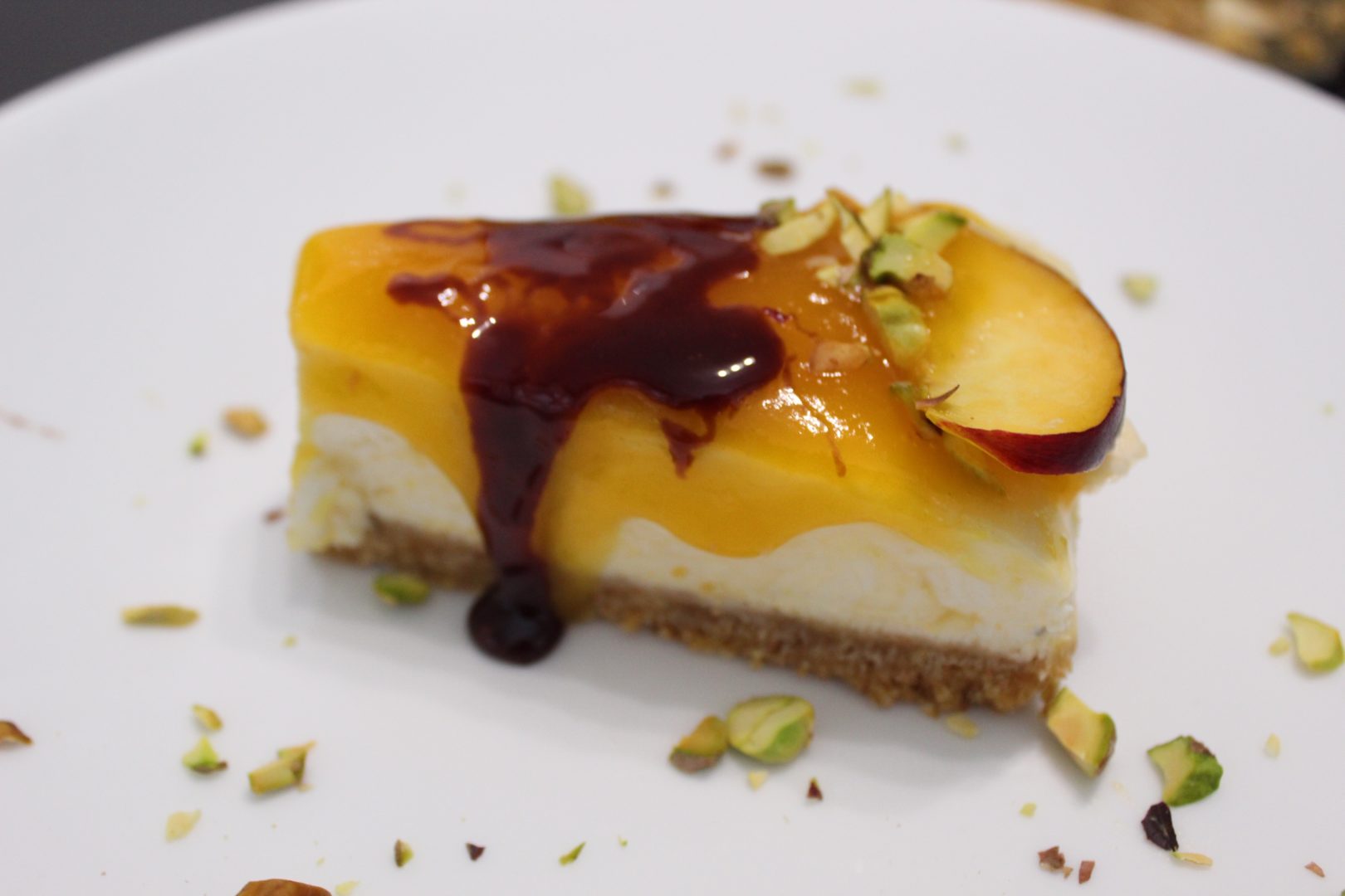 Cheesecake alle pesche con riduzione di Montepulciano cocendolibando